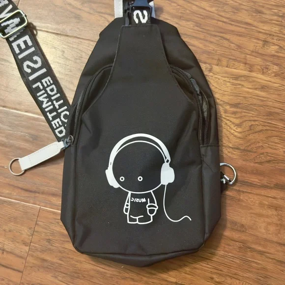 Black Sling Bag with Graphic Design - Picture 2 of 10